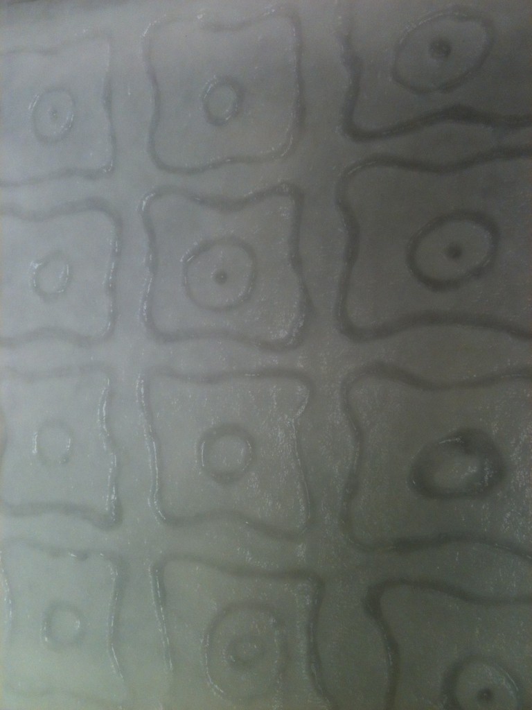 Detail of Winnie Radolan's fabric paint watermark in bamboo fiber.