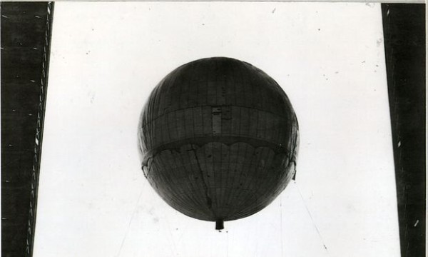 Balloon in hangar: A caption reads: "Overall photograph of Japanese balloon inflated with apparatus properly suspended." (Photo Credit: National Archives and Records Administration)