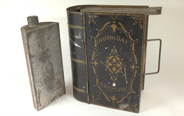 A lunchbox that looks like a book titled Noonday Exercise – circa 1875 – is among the ‘blooks’ on display at the Grolier Club this month in Manhattan. Photograph: Mindell Dubansky/The Metropolitan Museum of Art