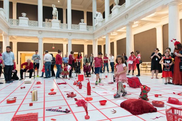 Museum visitors participate in the Celebration Red event held on Thursday, May 19, 2016 in the Hall of Sculpture. (Bryan Conley/Carnegie Museum of Art)