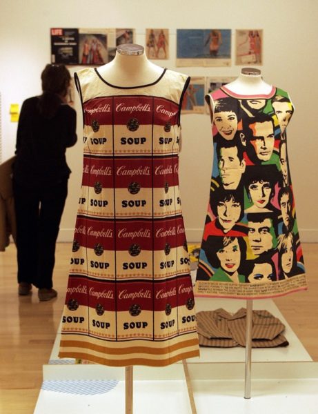 Athens, GREECE: Paper made Andy Warhol's legendary "souper dress" modelled on Campbell's Soup labels, is showcased next to Universal Studios one titled 'The big ones for 1968' featuring pictures of the popular movie stars, during the exhibition higlihting the pop-mania of sixties , the paper dress, opened in Athens 01 March 2007. The exhibition titled " RRRIP" features also work of other famous designers such as John Galliano, Issey Miyake and others. AFP PHOTO /LOUISA GOULIAMAKI (Photo credit should read LOUISA GOULIAMAKI/AFP/Getty Images)