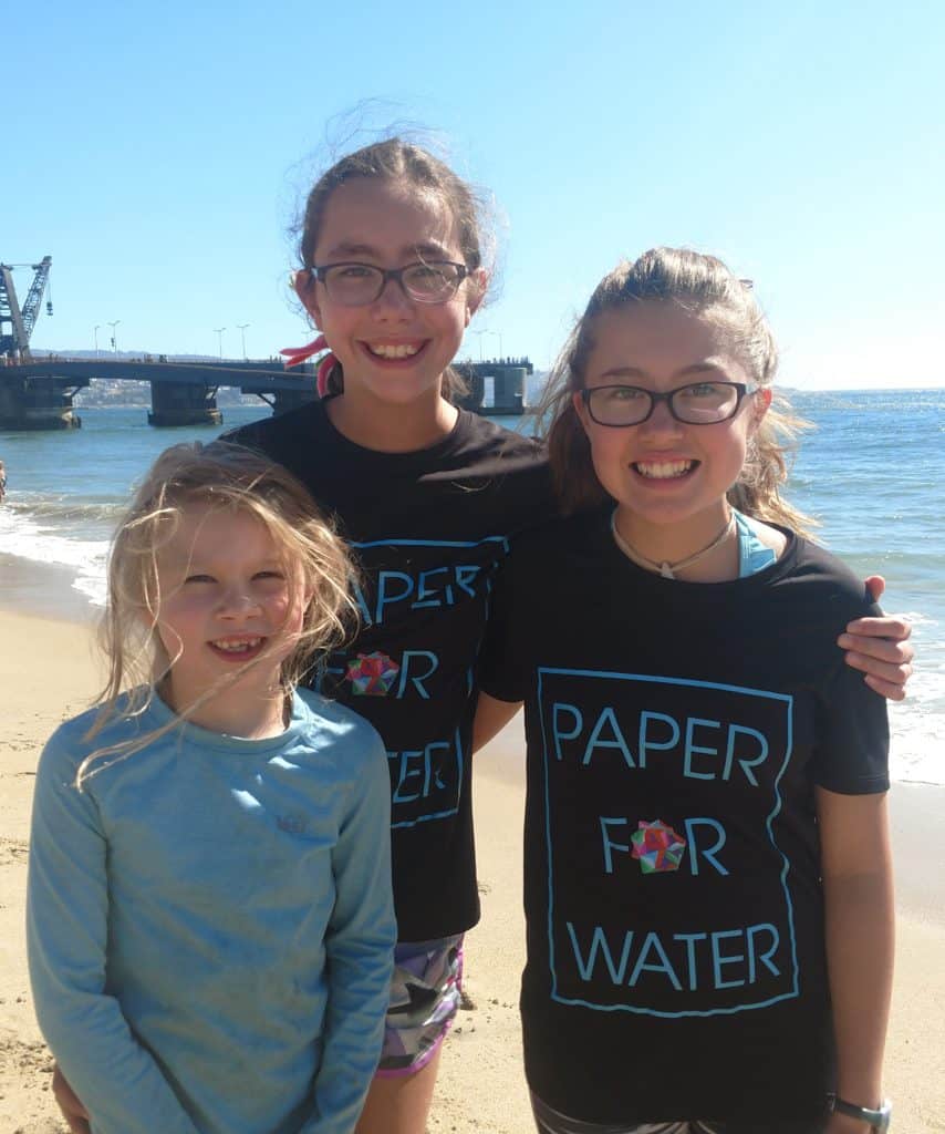 Paper For Water is a non-profit organization that raises money to build wells around the world so that everyone will have access to clean water. Listen to Isabelle and Katherine describe how they started the organization with a goal of raising $500 by folding origami ornaments and accepting donations for them when they were 5 and 8 years old. They ended up raising $10,000 and never looked back. Paper for Water has now raised more than $1.3M and has helped fund over 150 water projects in fourteen countries. Trinity talks about how she invented the Candy Dish, which is featured in the 2019 Twelve Months of Paper Calendar. Their father Ken taught the girls origami, which he learned as a child from his Japanese mother and then from the books of Tomoko Fuse, whose modular origami led to the ornaments his girls now create. And their mother Deborah tells us about some of the projects, the volunteers and just how much of a difference kids can make in changing the world.