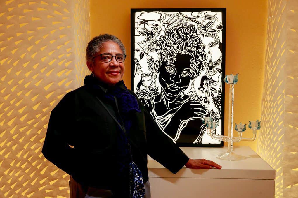 Seattle-based artist Barbara Earl Thomas next to her work, “Baileh, 2020,” part of “The Geography of Innocence” exhibition of Thomas’ works at Seattle Art Museum. (Erika Schultz / The Seattle Times)